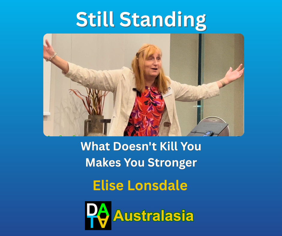 Elise Speaking with her arms out with the Message Still Standing